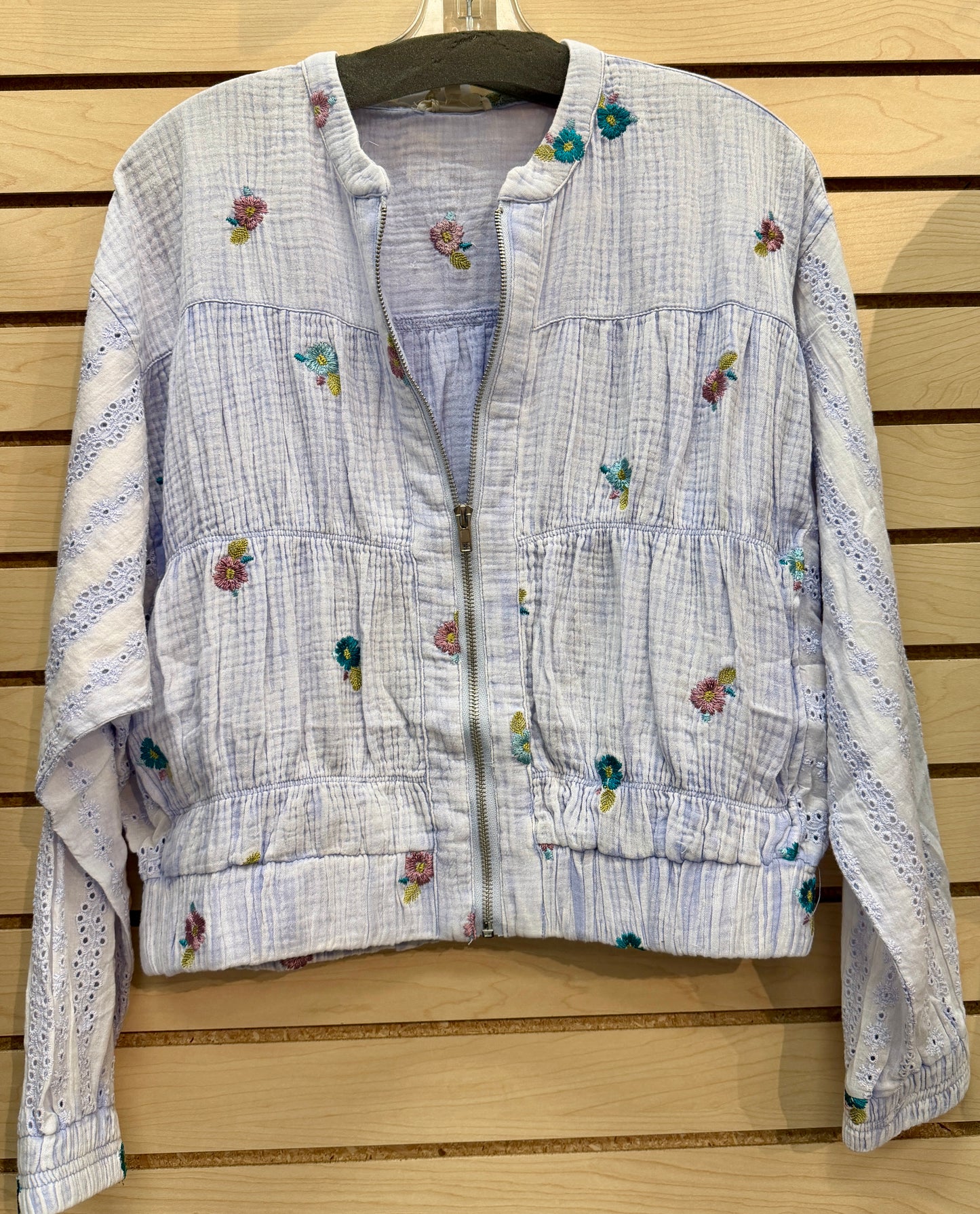 Periwinkle zip jacket with embroidered flowers and eyelet sleeves