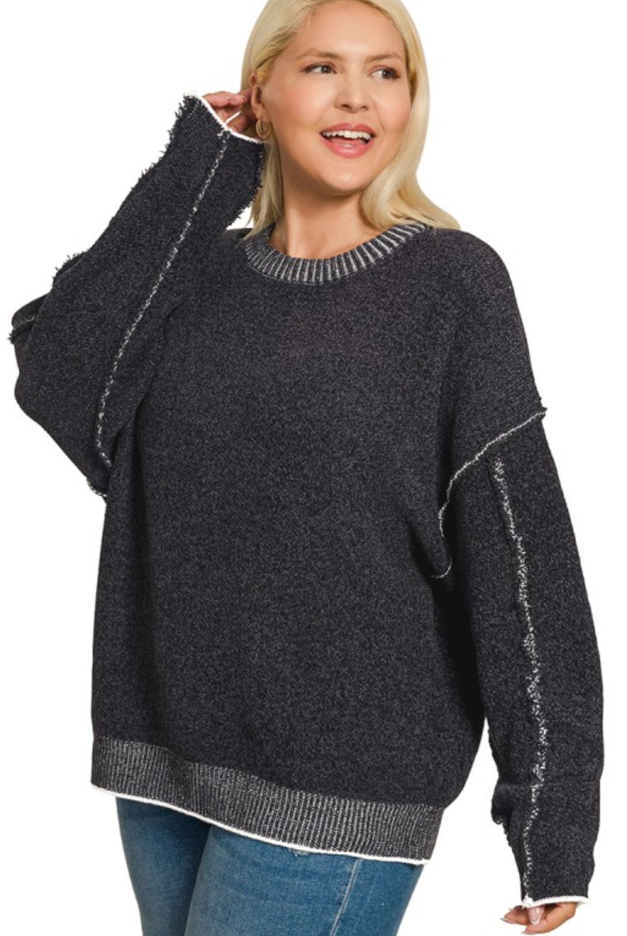 Plus size black sweater with white seams detail