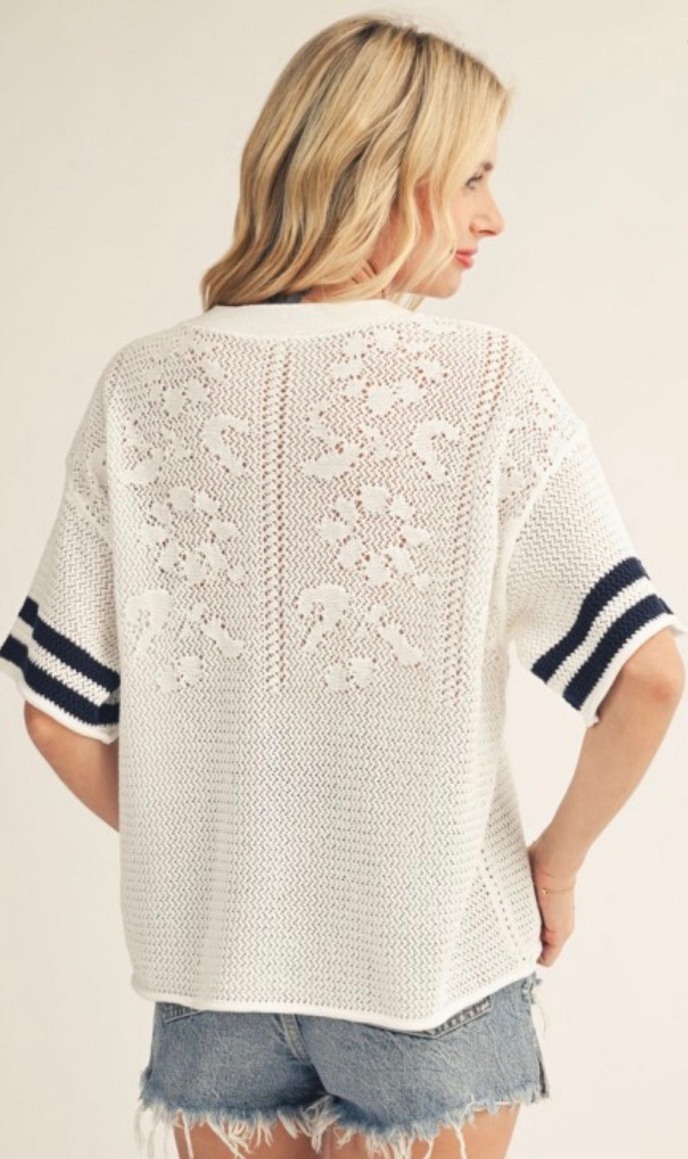 PREORDER NOW, Arriving Friday…White sweater knit top with floral detail and sleeve stripes