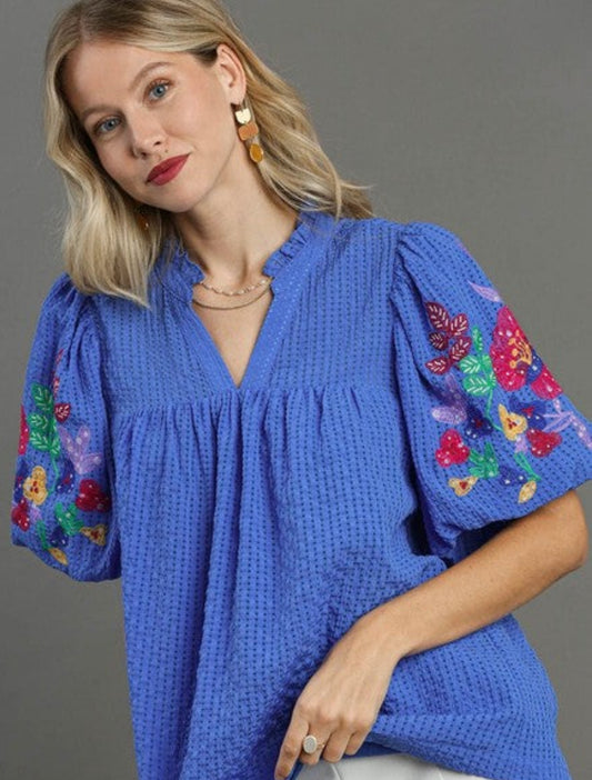 Ocean blue puff sleeve top with embroidered flowers