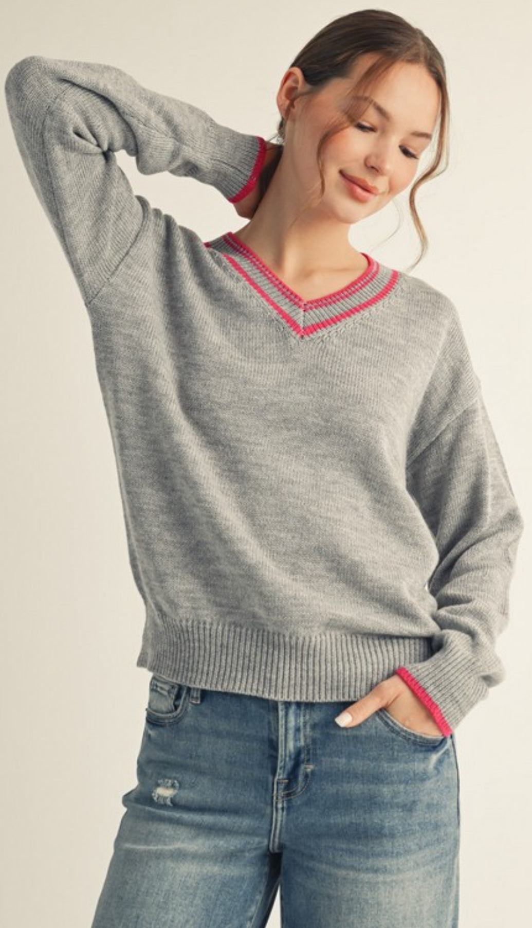 Grey v neck sweater with pink trim