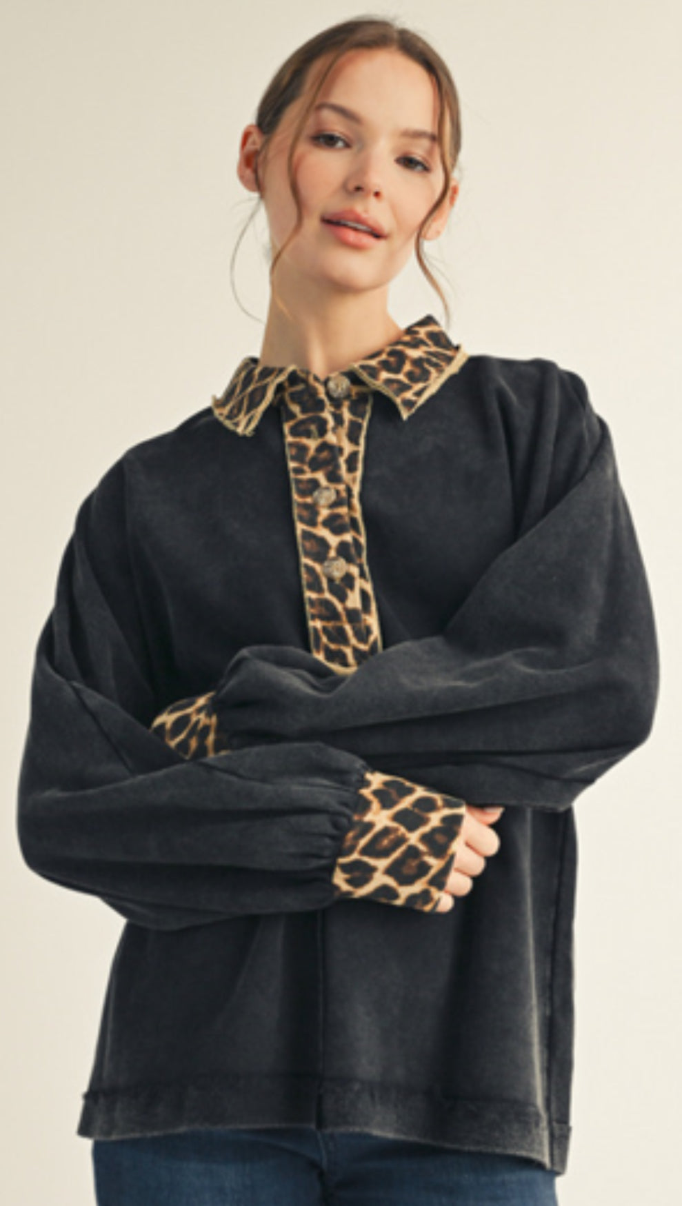 Black polo with leopard trim