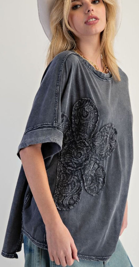 Dark grey top with lace flower patch