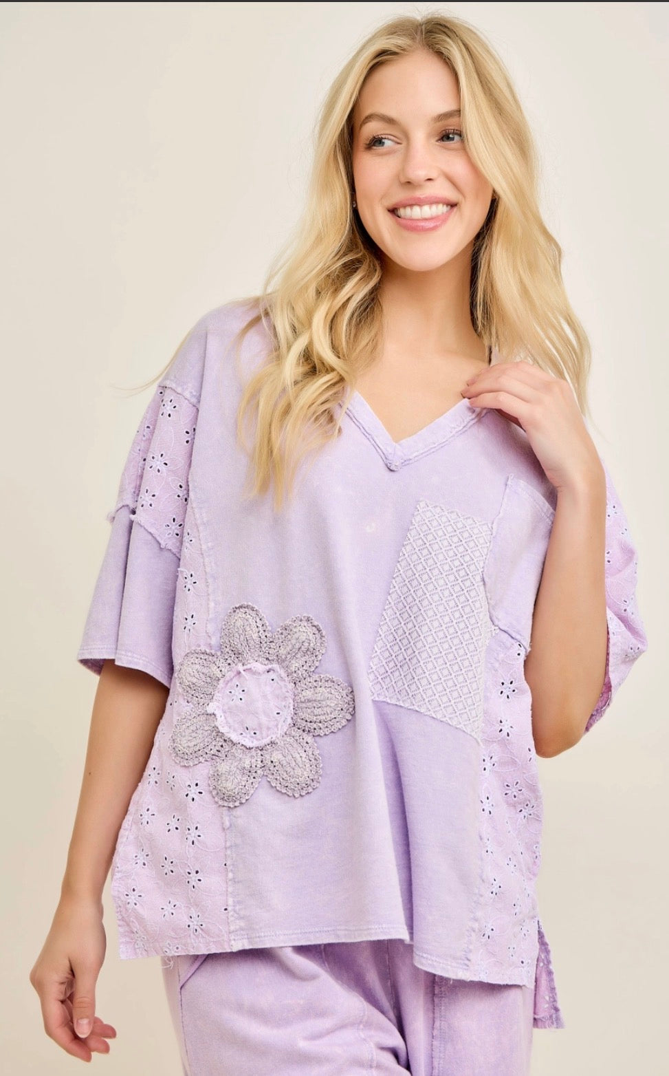 Lilac top with crochet flower and patches