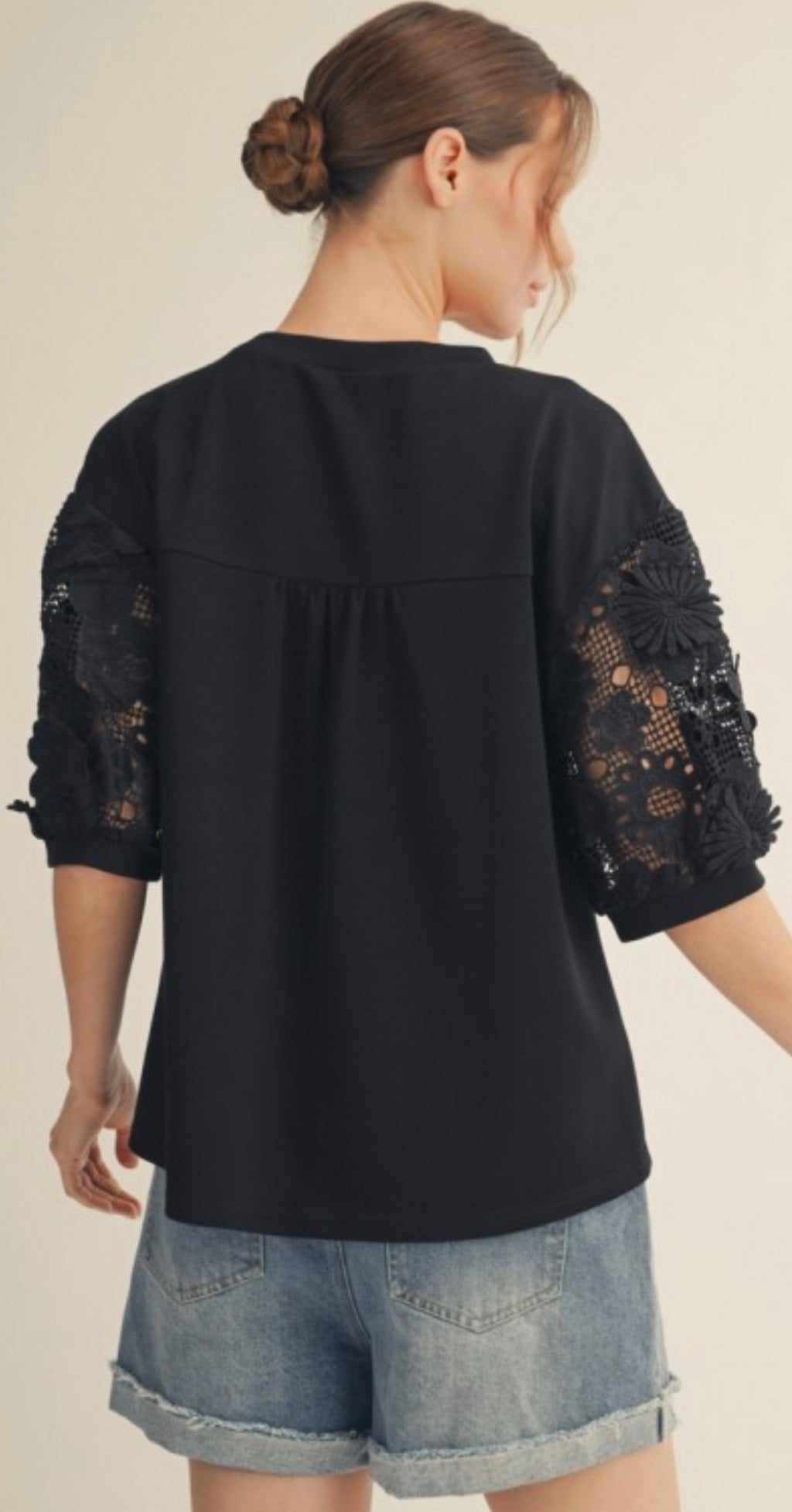 Black relaxed fit top with lace sleeves