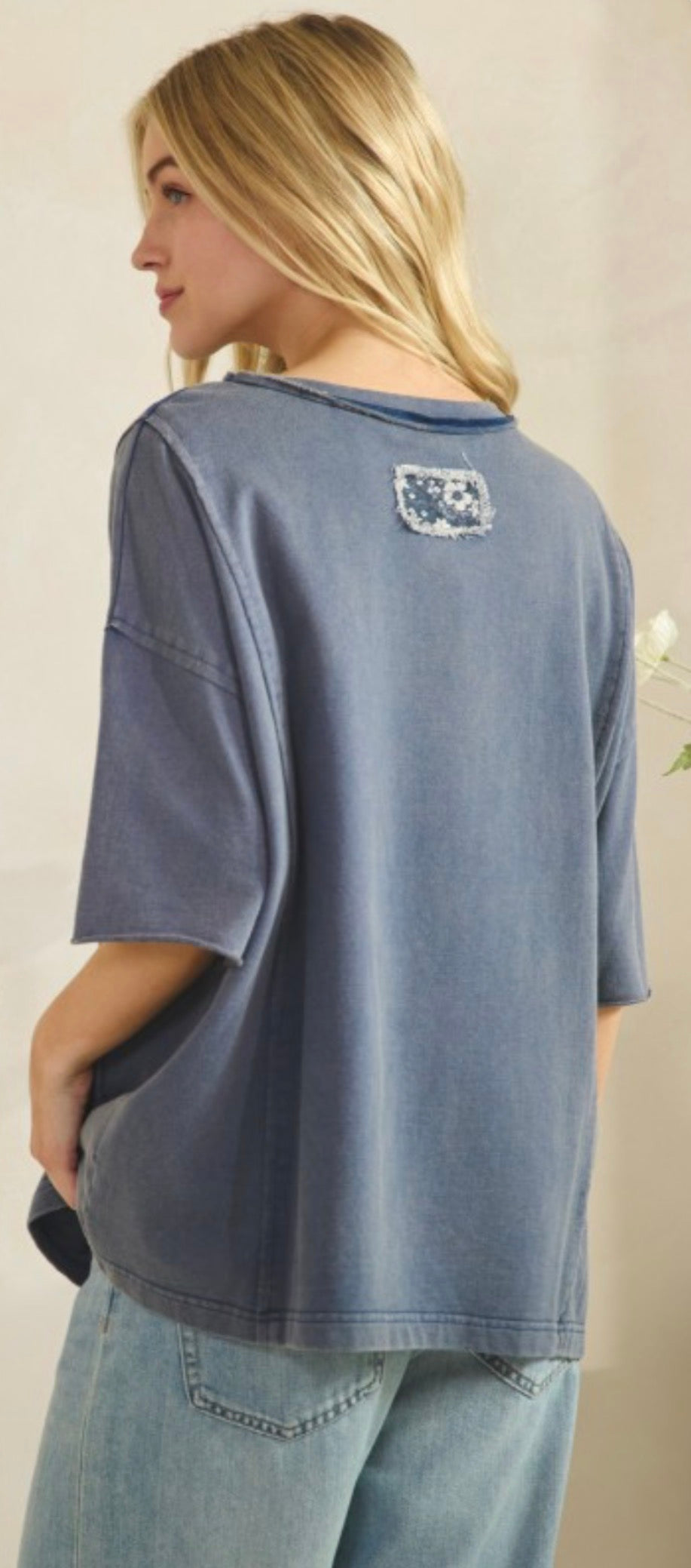 Navy loose fit top with floral daisy