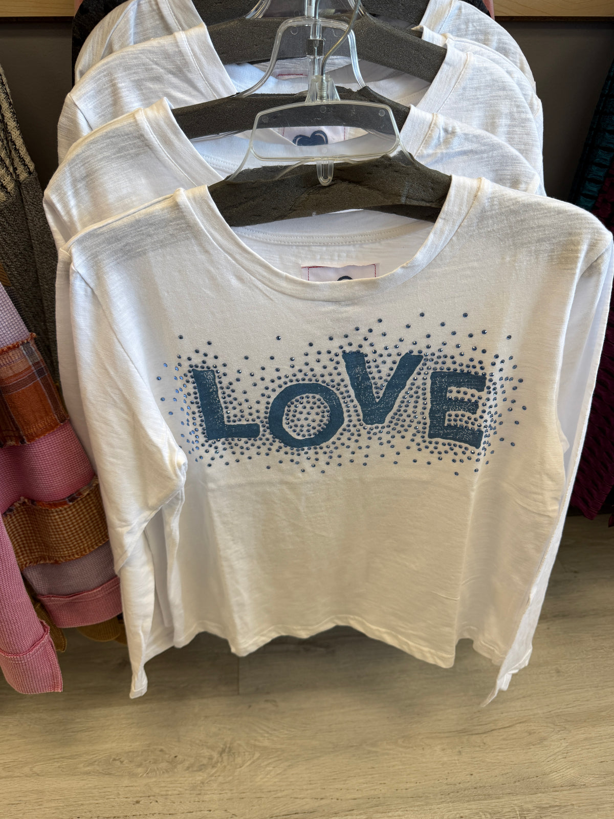 White long sleeve tee with blue LOVE and blue crystals