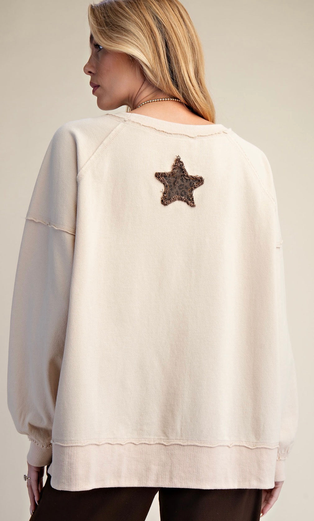 Ecru loose fit top with star patch