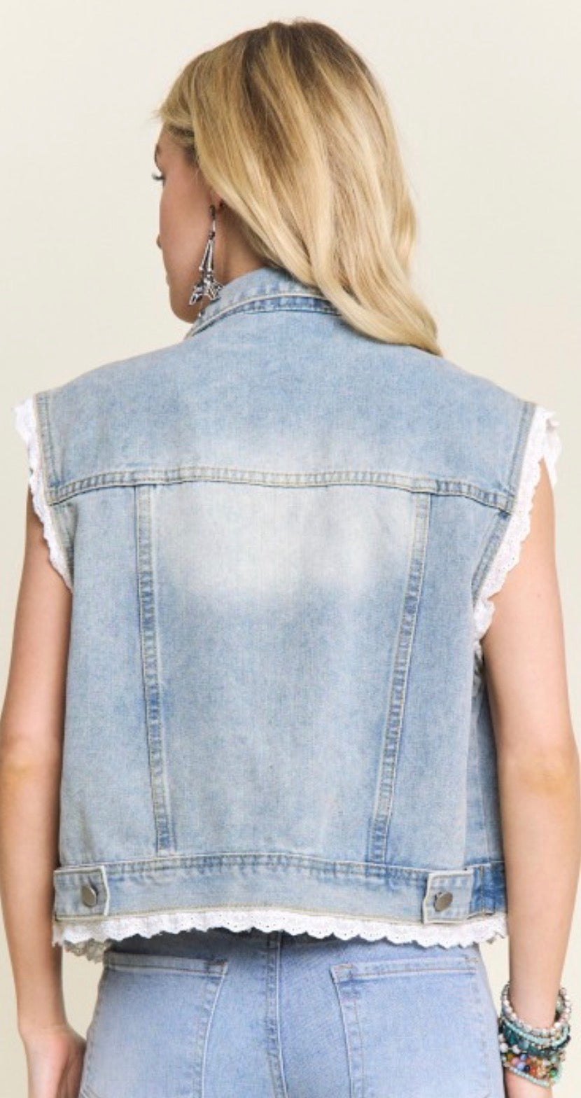 Denim vest with crochet detail