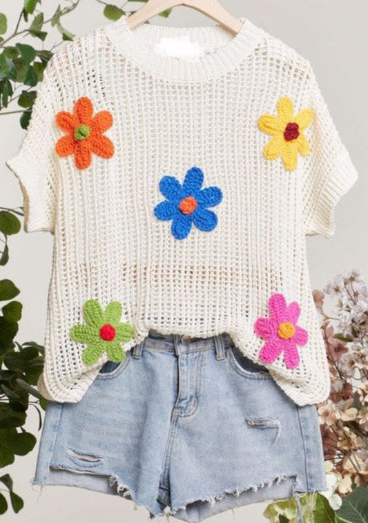 Ivory short sleeve net top with multi color daisy patches
