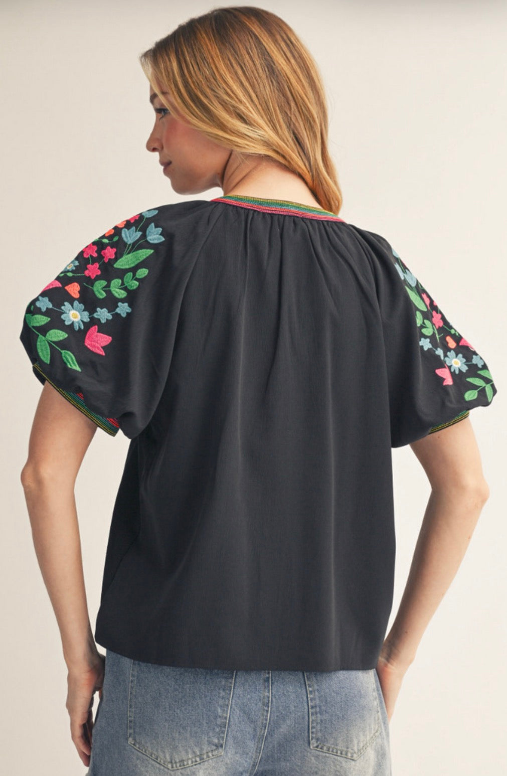 Black puff sleeve top with floral embroidery