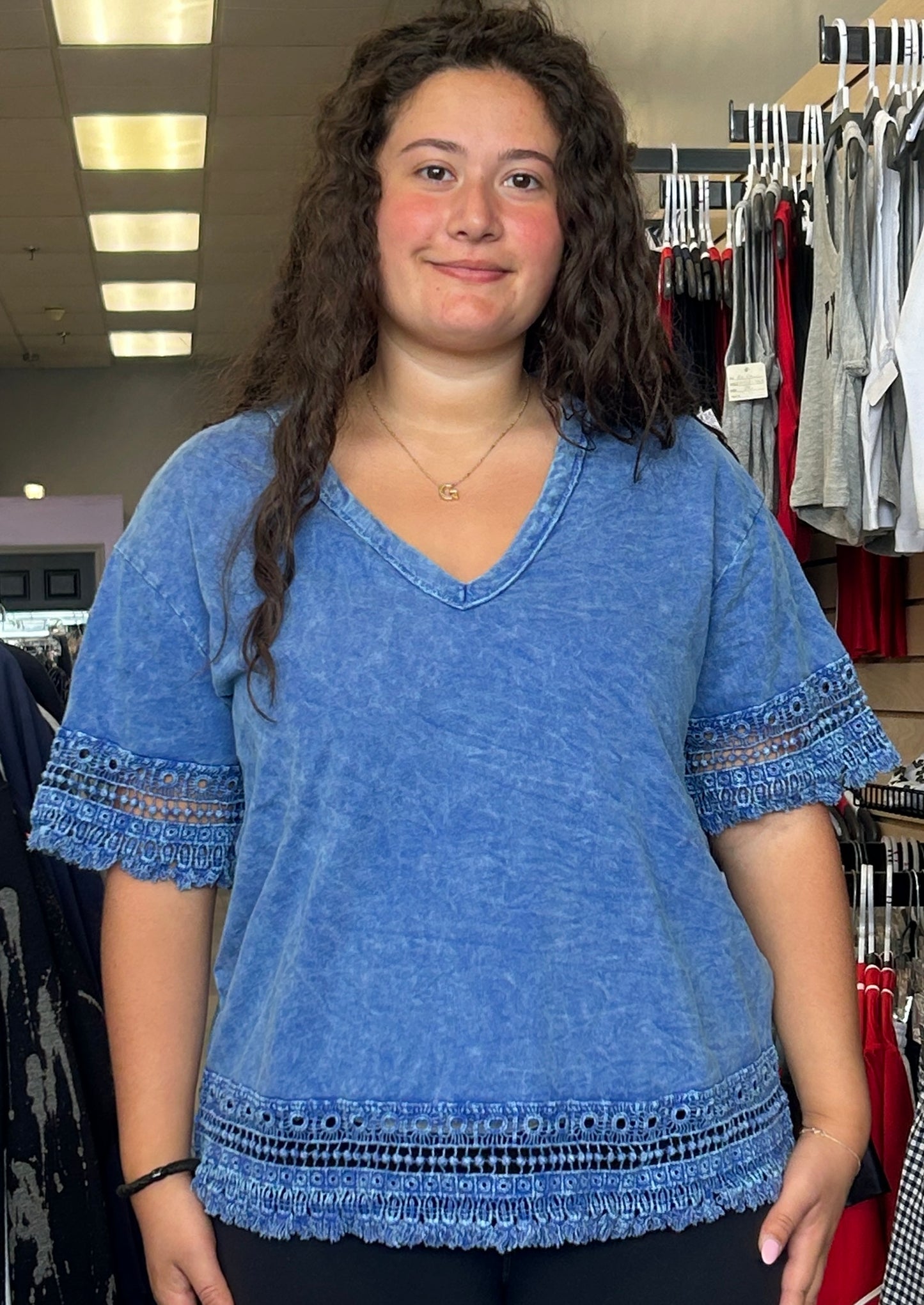 Cobalt blue fringe and eyelet detail v neck top
