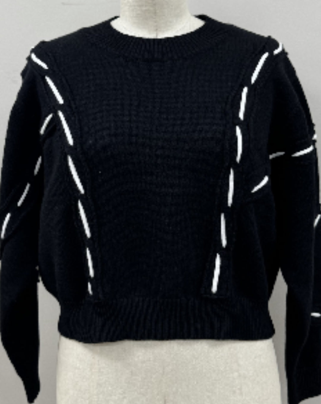 THML black sweater with white stitching