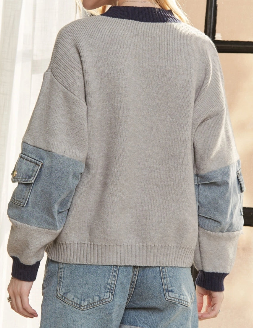 Grey sweater with colorblock trim and denim pockets
