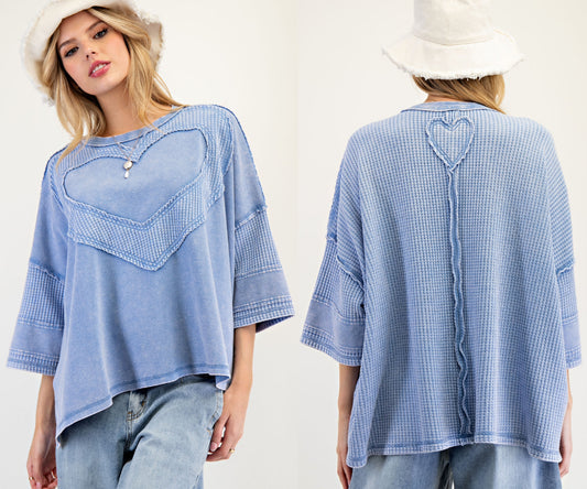 Blue loose fit top with large tonal heart on front and small heart on back