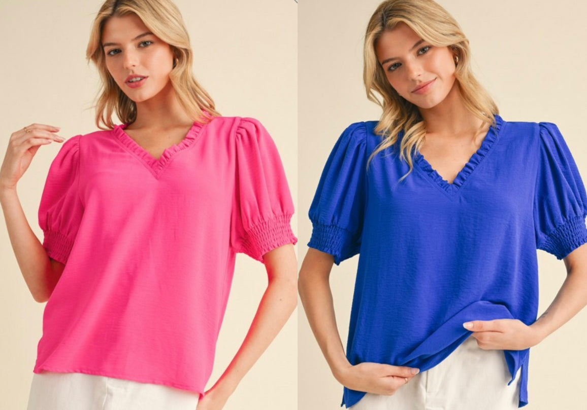 Hot pink and royal lightweight airflow tops with ruffle detail and puff sleeves