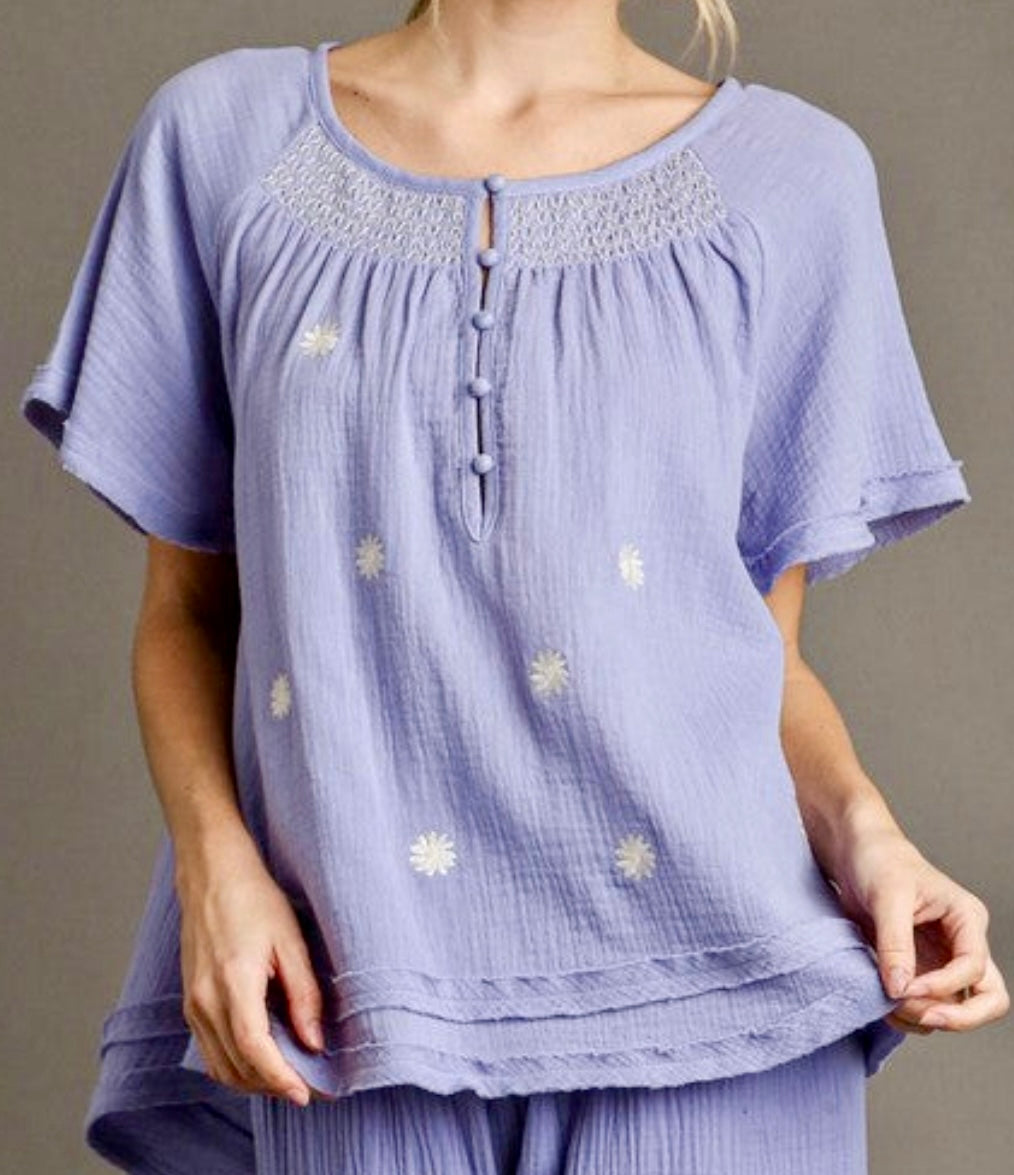 Purple gauze top with daisies and smocked detail