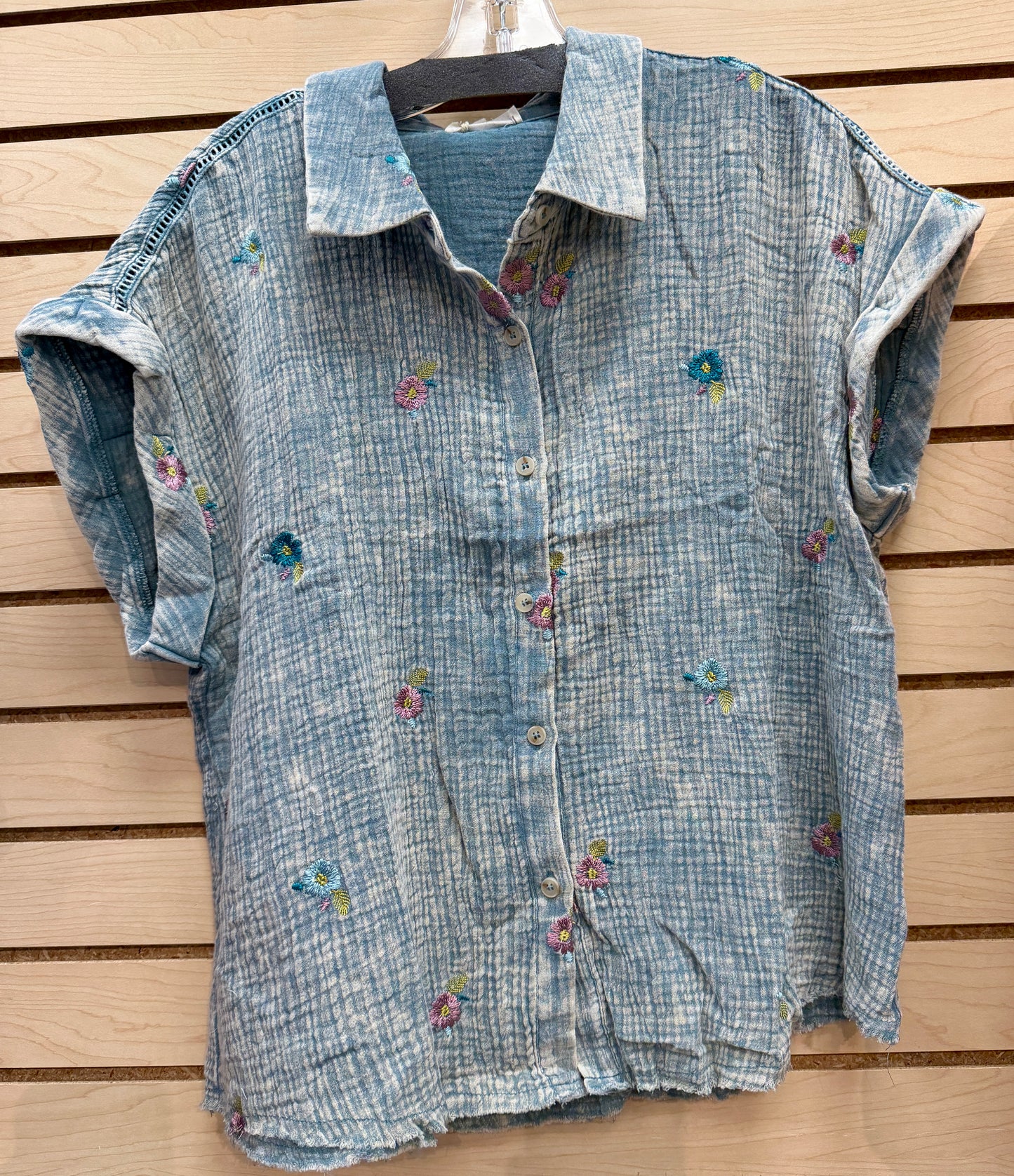 Green gauze blouse with embroidered flowers