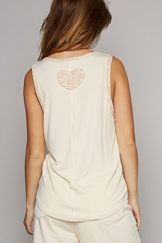 Ivory tank with pink floral trim and peace sign heart