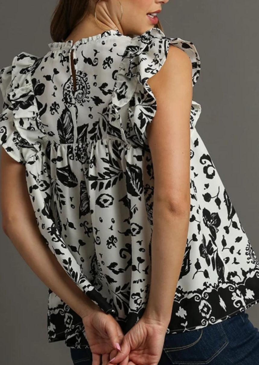 Black/white print tank with chest cutouts and flounce sleeves