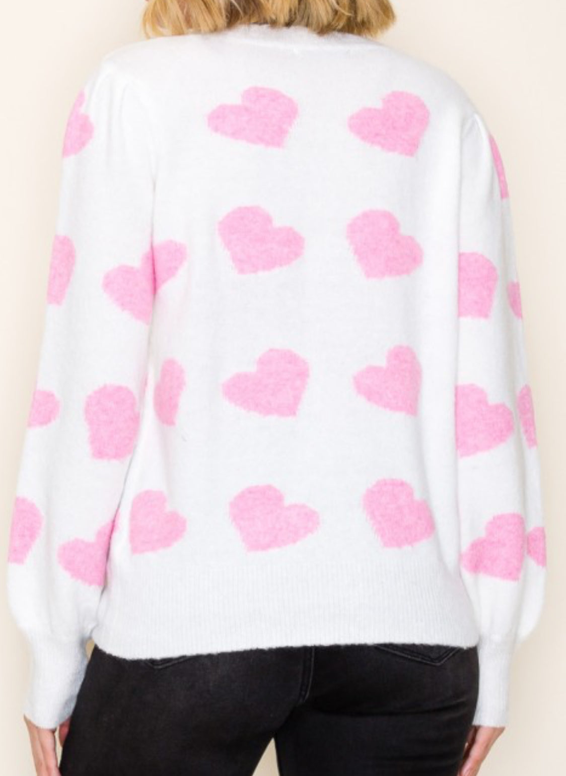 White soft sweater with pink hearts