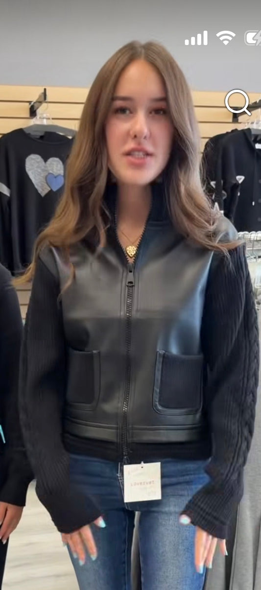 Black faux leather zip bomber jacket with sweater knit sleeves and pockets
