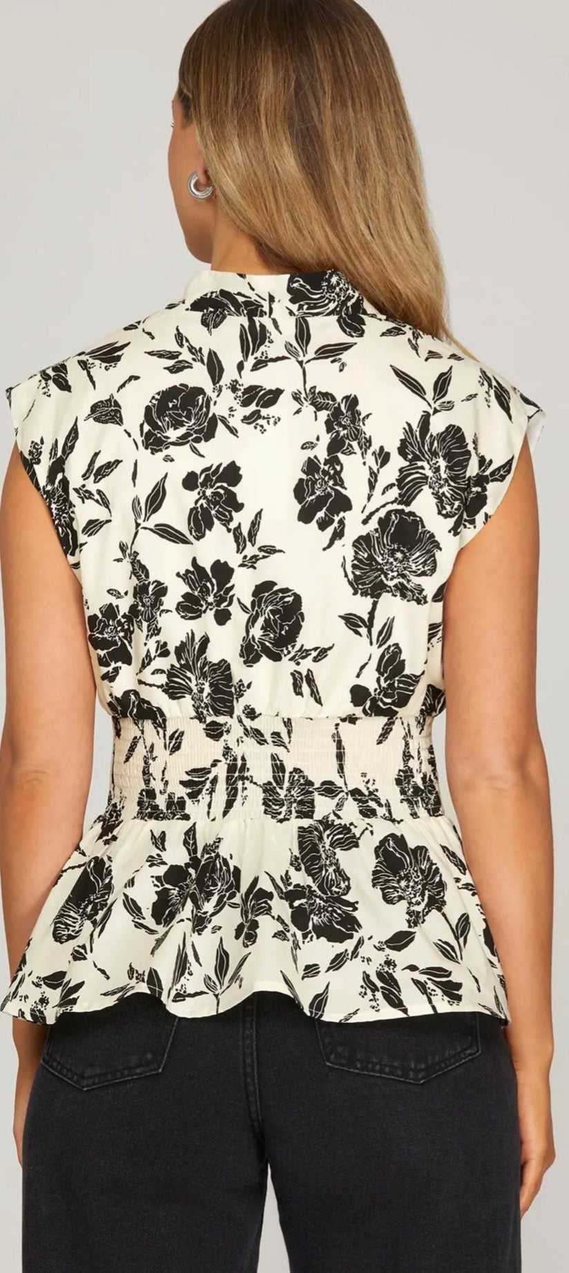 Cream with black floral zip front sleeveless top