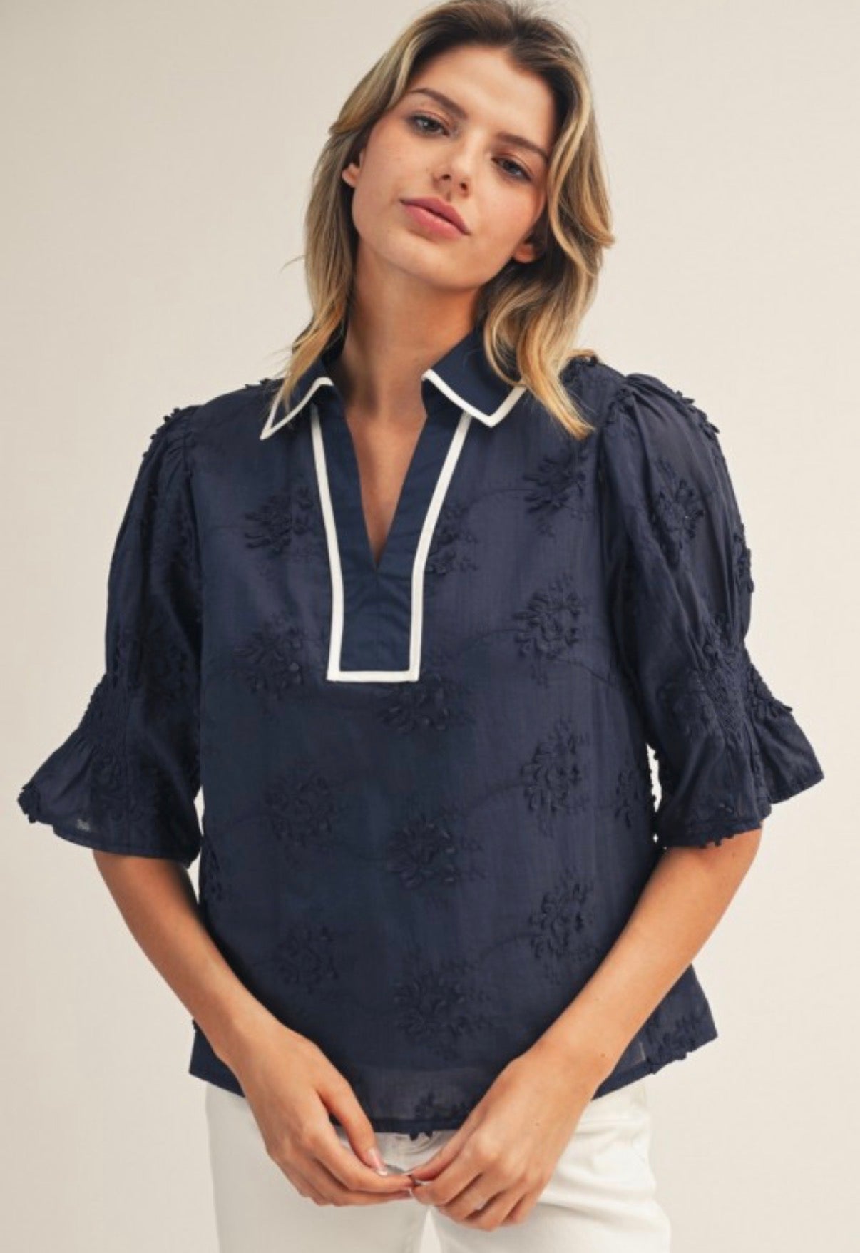 PREORDER NOW, Arriving Friday…Navy floral texture top with white stripe v neck and collar