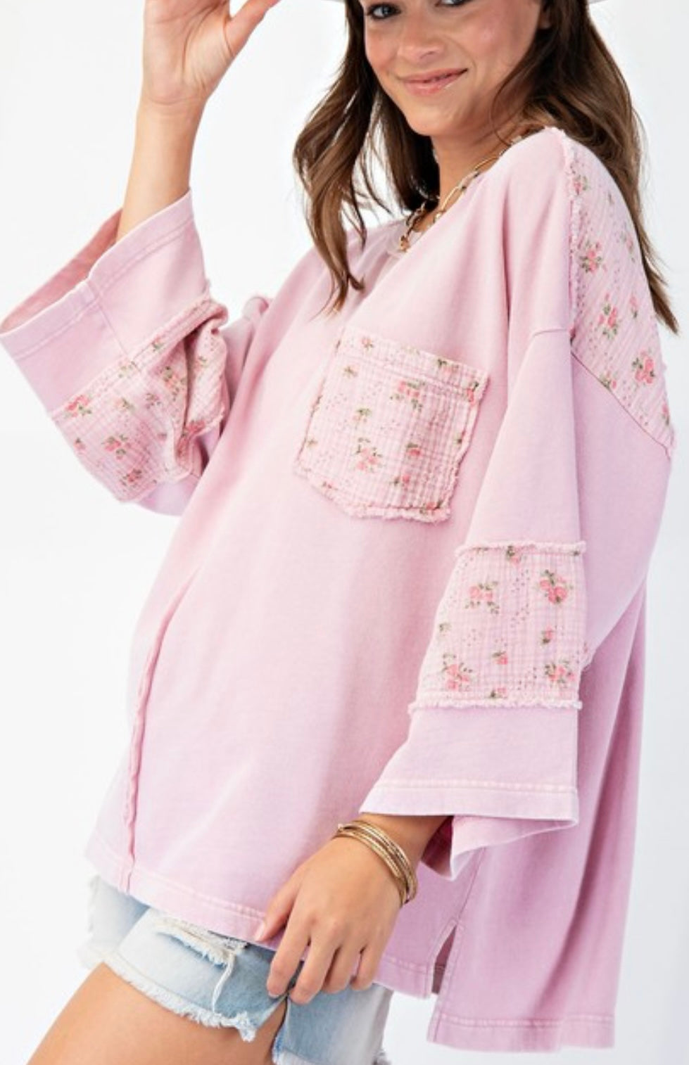 Pink loose fit 3/4 sleeve top with floral trim and pocket