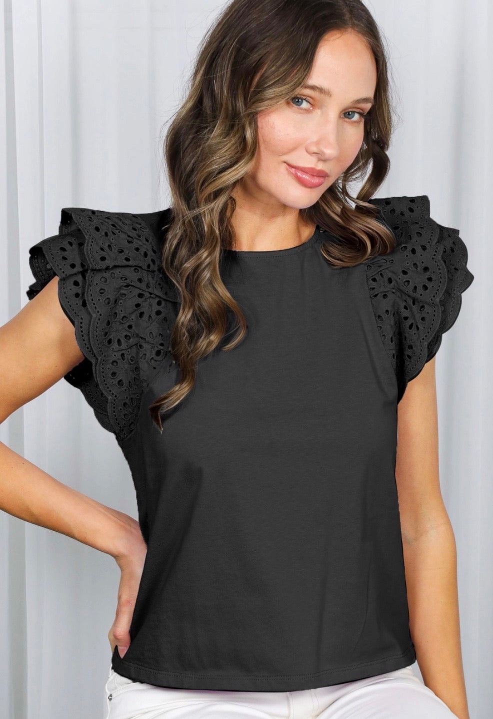 PREORDER NOW, Arriving Monday…Black top with eyelet ruffle sleeves