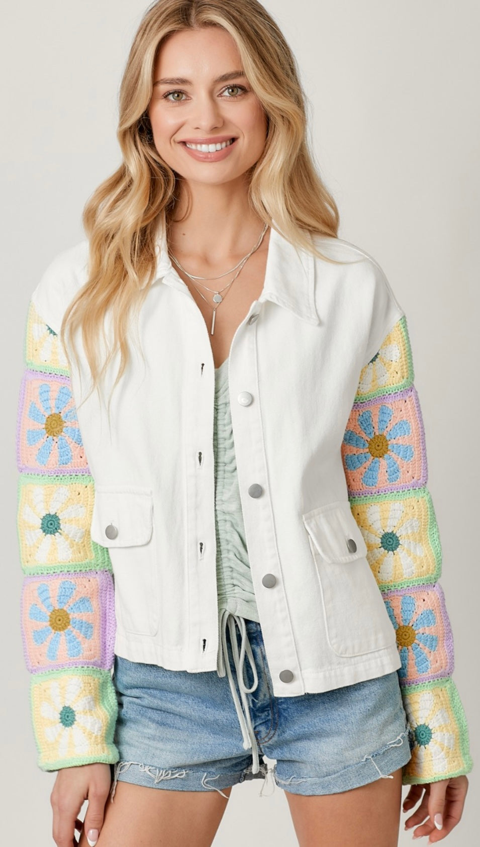 White denim jacket with multicolor crochet sleeves