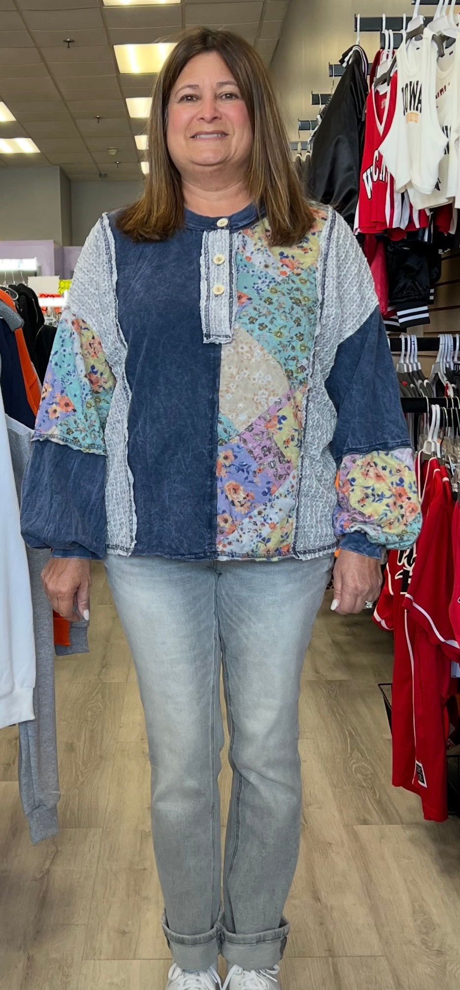 Navy top with floral and crochet inserts