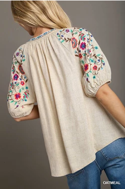 Ivory linen blend notch neck top with floral embroidery