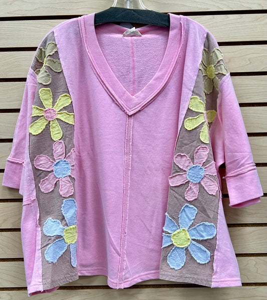 Pink loose fit top with daisy patches