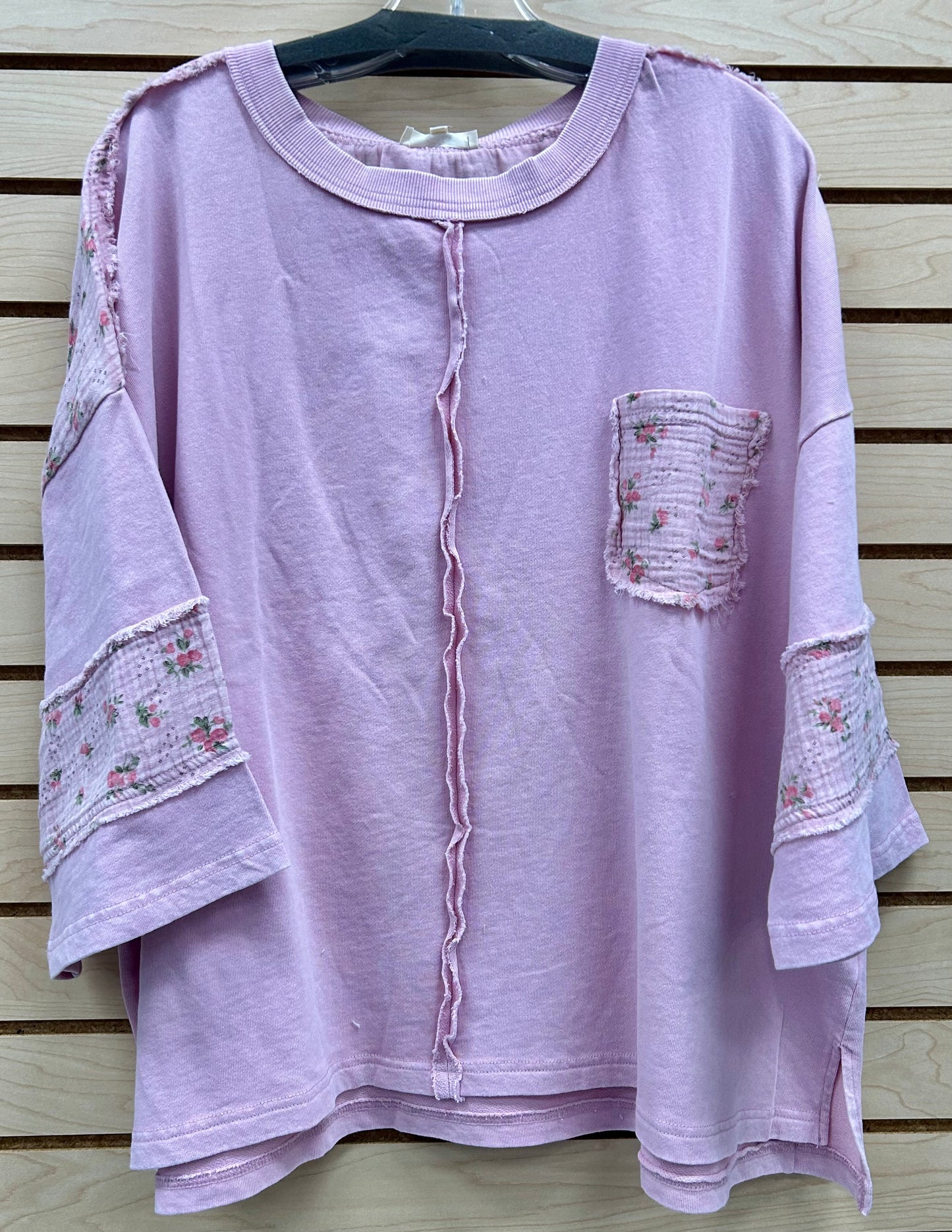 Pink loose fit 3/4 sleeve top with floral trim and pocket