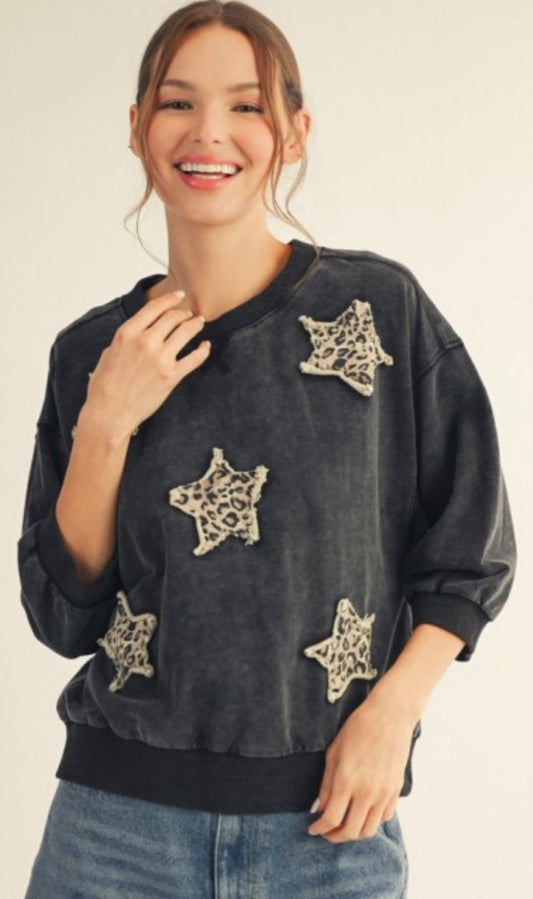 Black elbow sleeve sweatshirt with leopard stars
