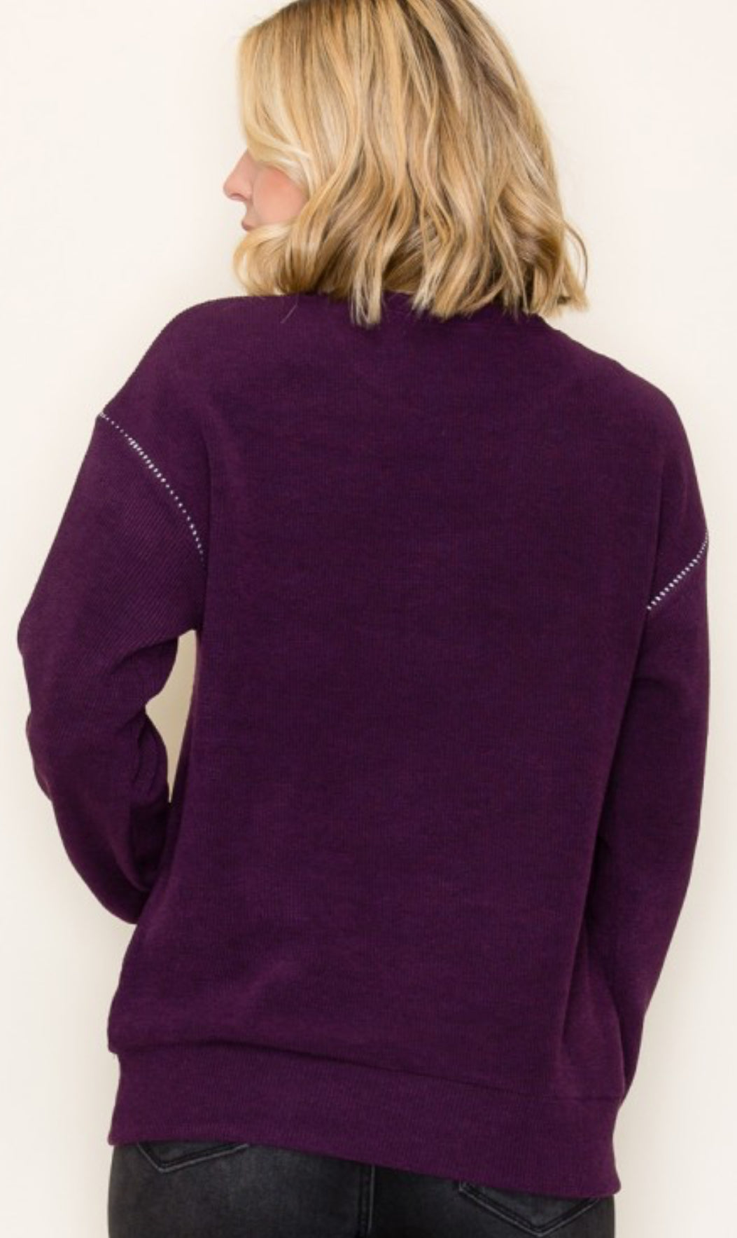 Black or Plum textured sweater knit top with sleeve stitching