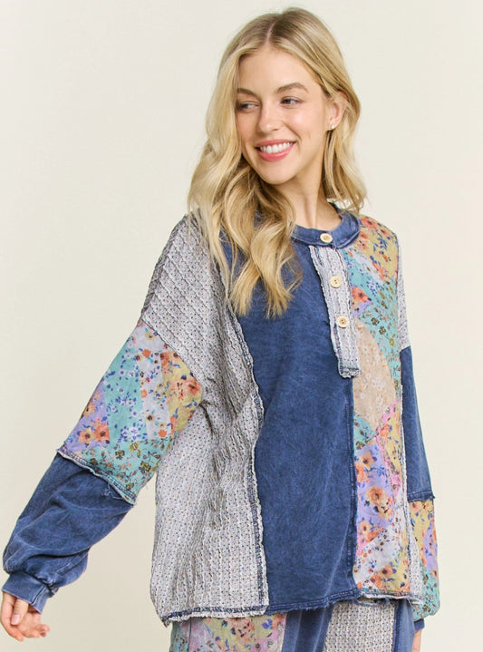 Navy top with floral and crochet inserts