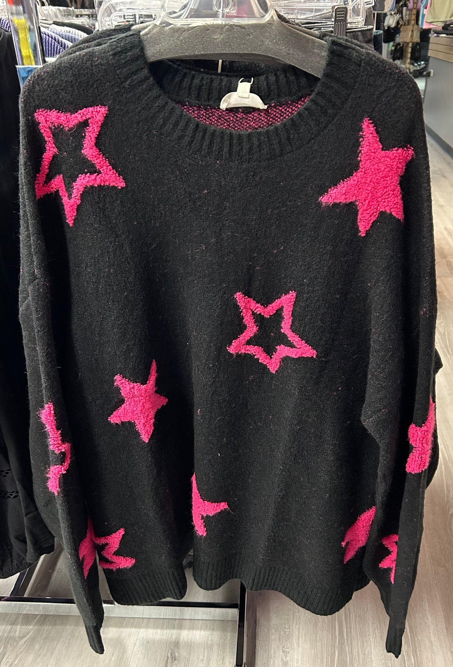 Plus size black sweater with pink stars