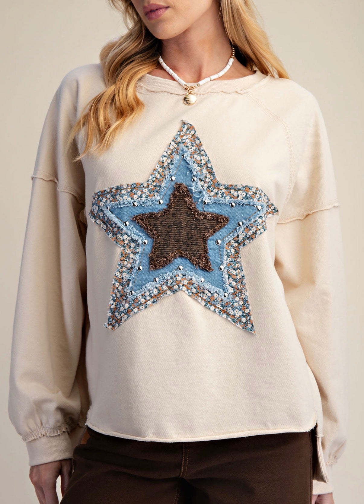 Ecru loose fit top with star patch