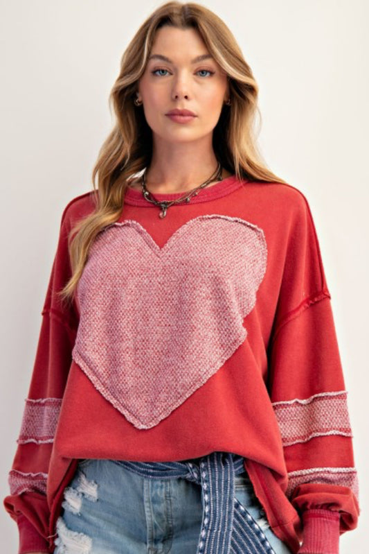 Red loose fit sweatshirt with large heart and sleeve stripes
