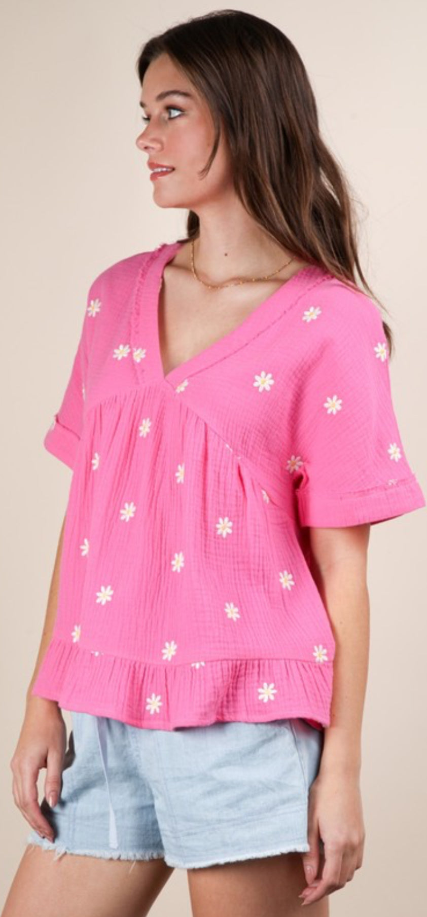 Pink flounce top with white daisies