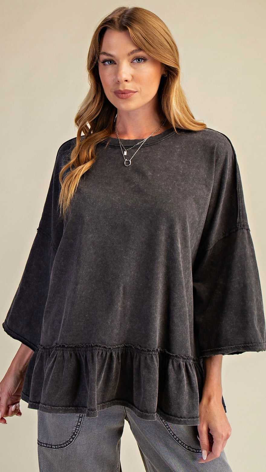 PREORDER NOW, Arriving Monday…Mineral wash black loose fit top with elbow length sleeves and flounce bottom