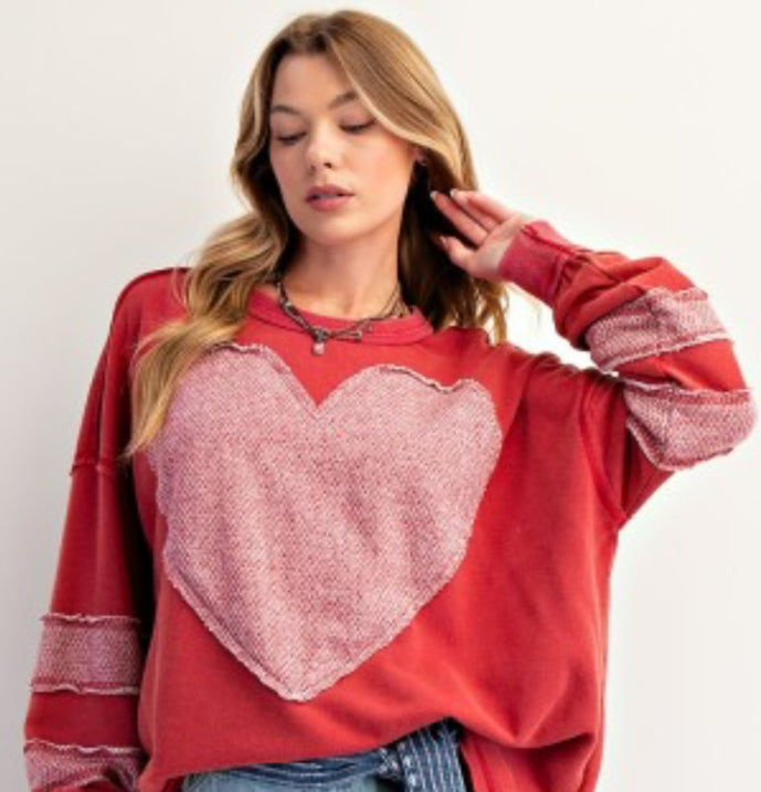 Red loose fit sweatshirt with large heart and sleeve stripes