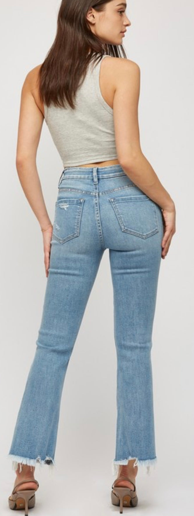 Stretch crop flare jeans with fray bottom in medium wash and black (mid/high rise)