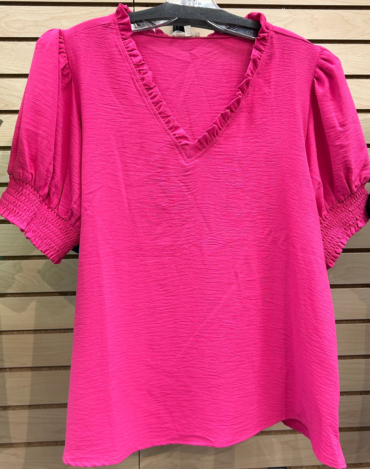 Hot pink and royal lightweight airflow tops with ruffle detail and puff sleeves