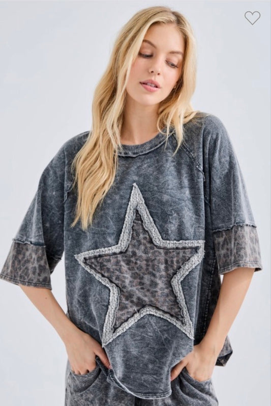 Mineral wash black top with leopard star and sleeve trim