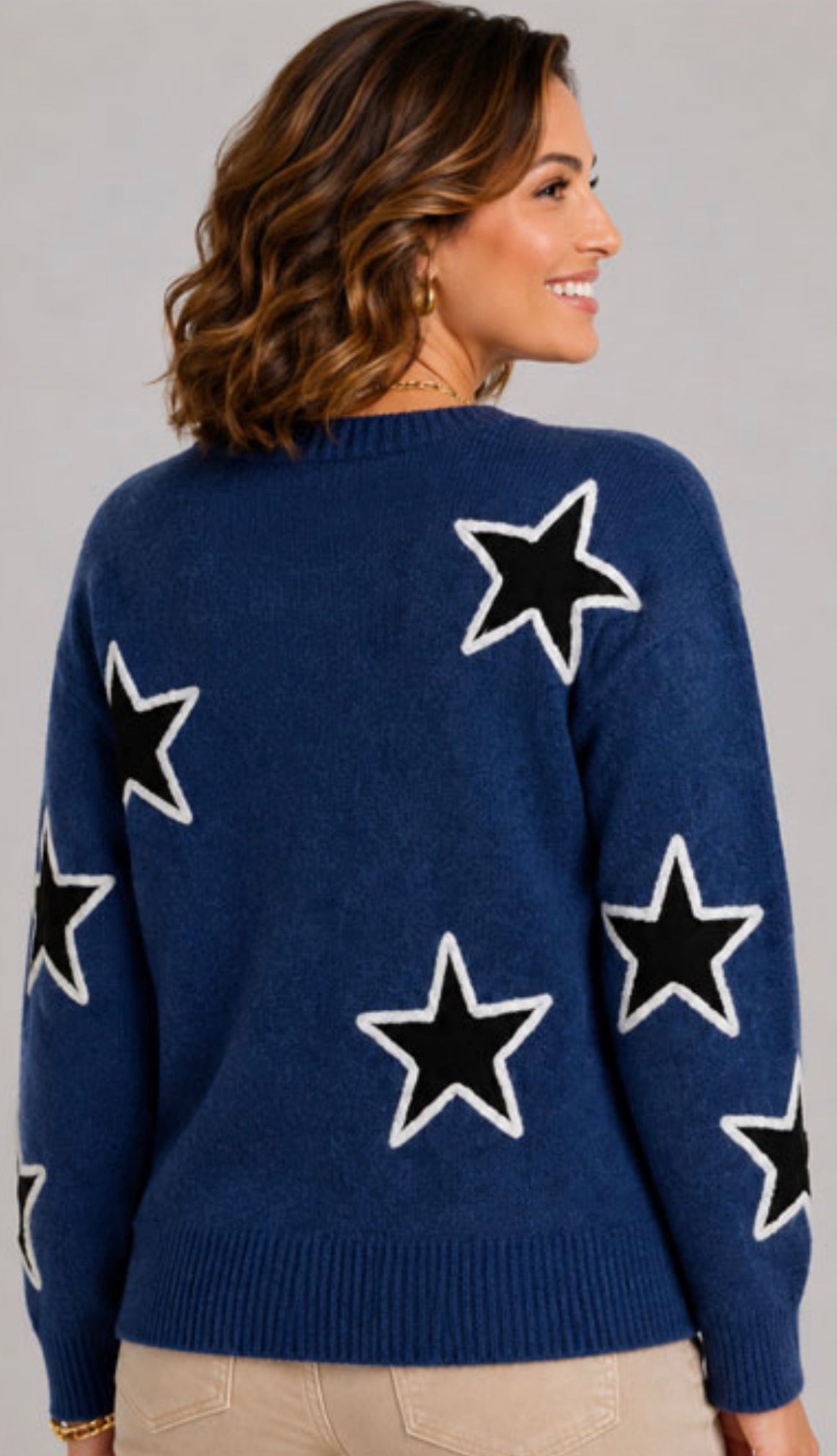 Navy sweater with black and white stars
