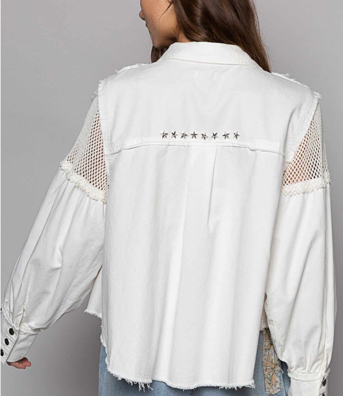 Off white jacket with star studs and net inserts