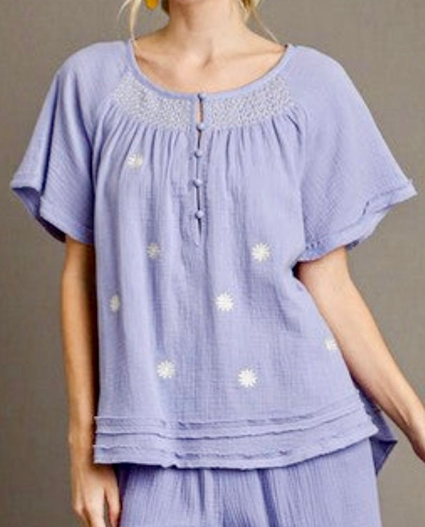 Purple gauze top with daisies and smocked detail